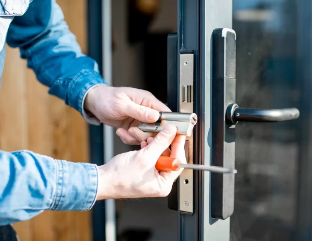 Professional locksmith unlocking main front door | Featured Image for the top-level Emergency Locksmith Gold Coast service landing page